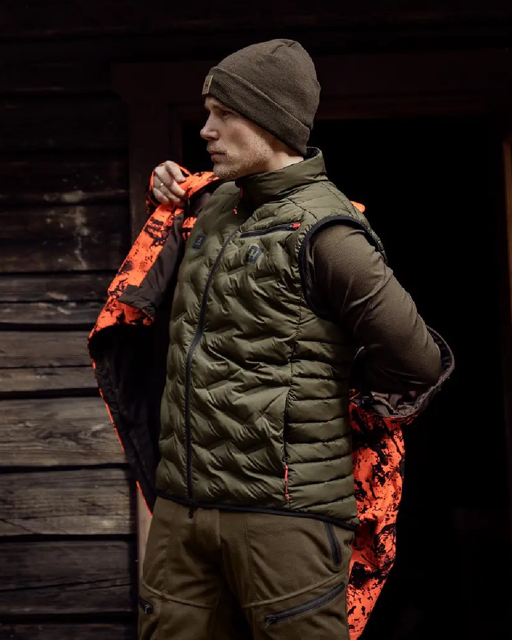 Willow Green Coloured Harkila Clim8 Insulated Waistcoat on outdoor background #colour_willow-green