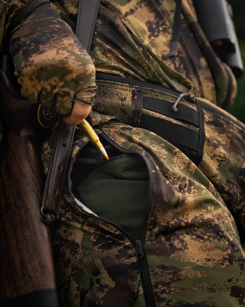 AXIS Forest Coloured Harkila Deer Stalker Camo Cover Trousers on outdoor background #colour_axis-forest