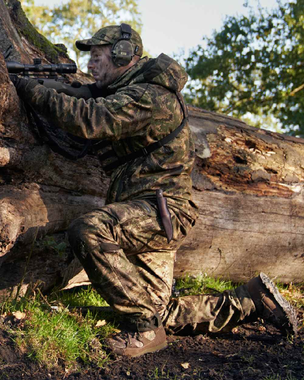 AXIS Forest Coloured Harkila Deer Stalker Camo HWS Jacket on forest background #colour_axis-forest