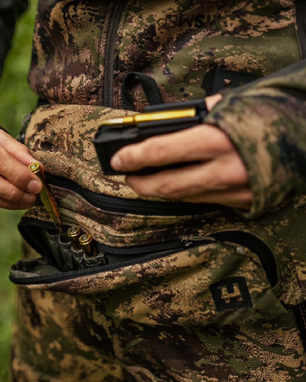 AXIS Forest Coloured Harkila Deer Stalker Waist Pack on outdoor background #colour_axis-forest