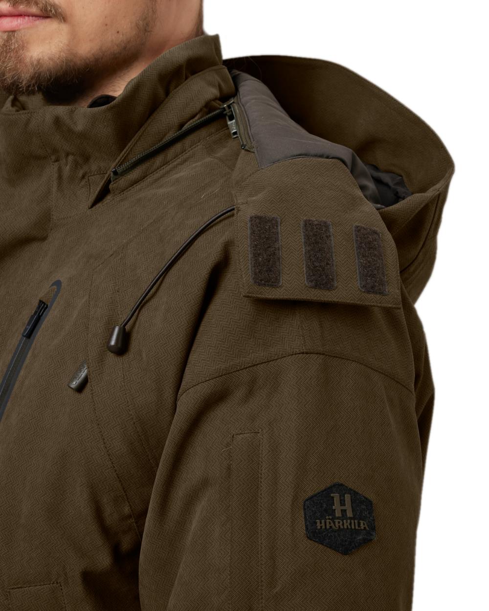 Willow Green Coloured Harkila Driven Hunt HWS Insulated Jacket on white background #colour_willow-green