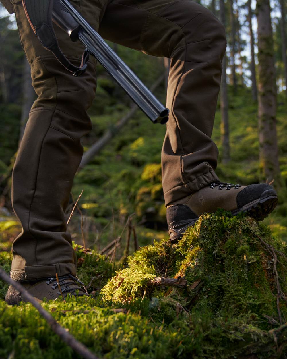 Willow Green Coloured Harkila Forest Hunter Mid GTX Boots on outdoor background #colour_willow-green