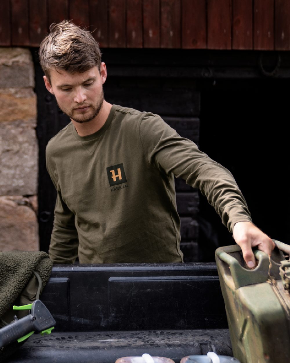 Willow Green Coloured Harkila Gorm Long Sleeve T-Shirt on outdoor background #colour_willow-green