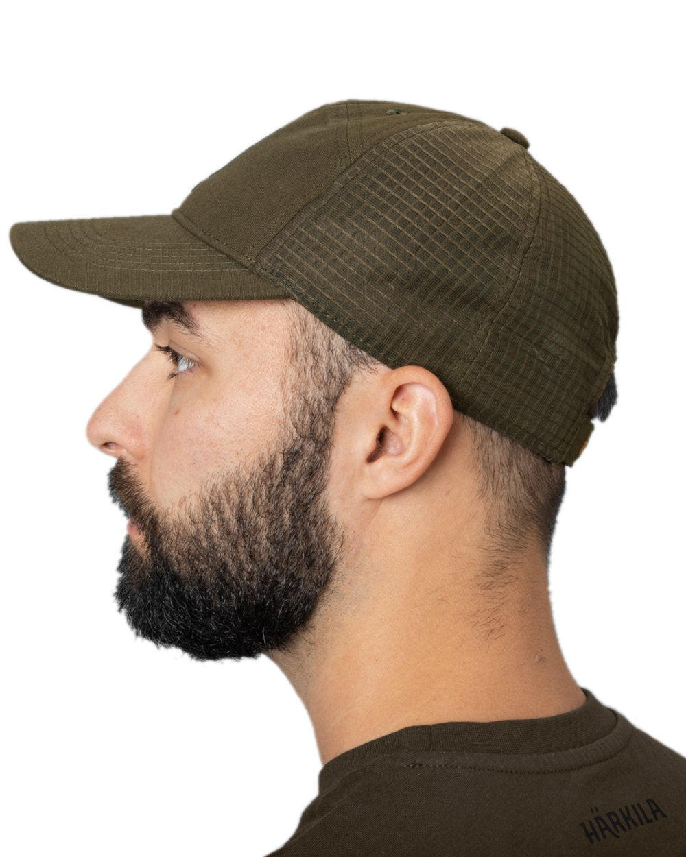Willow Green Coloured Harkila Instinct Cap on white background #colour_willow-green