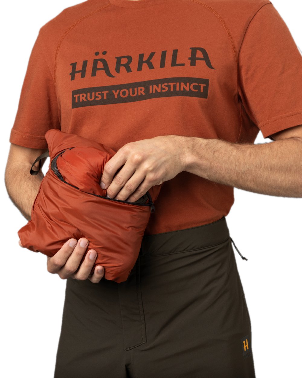 Willow Green Coloured Harkila Logmar Insulated Packable Waistcoat on white background #colour_willow-green
