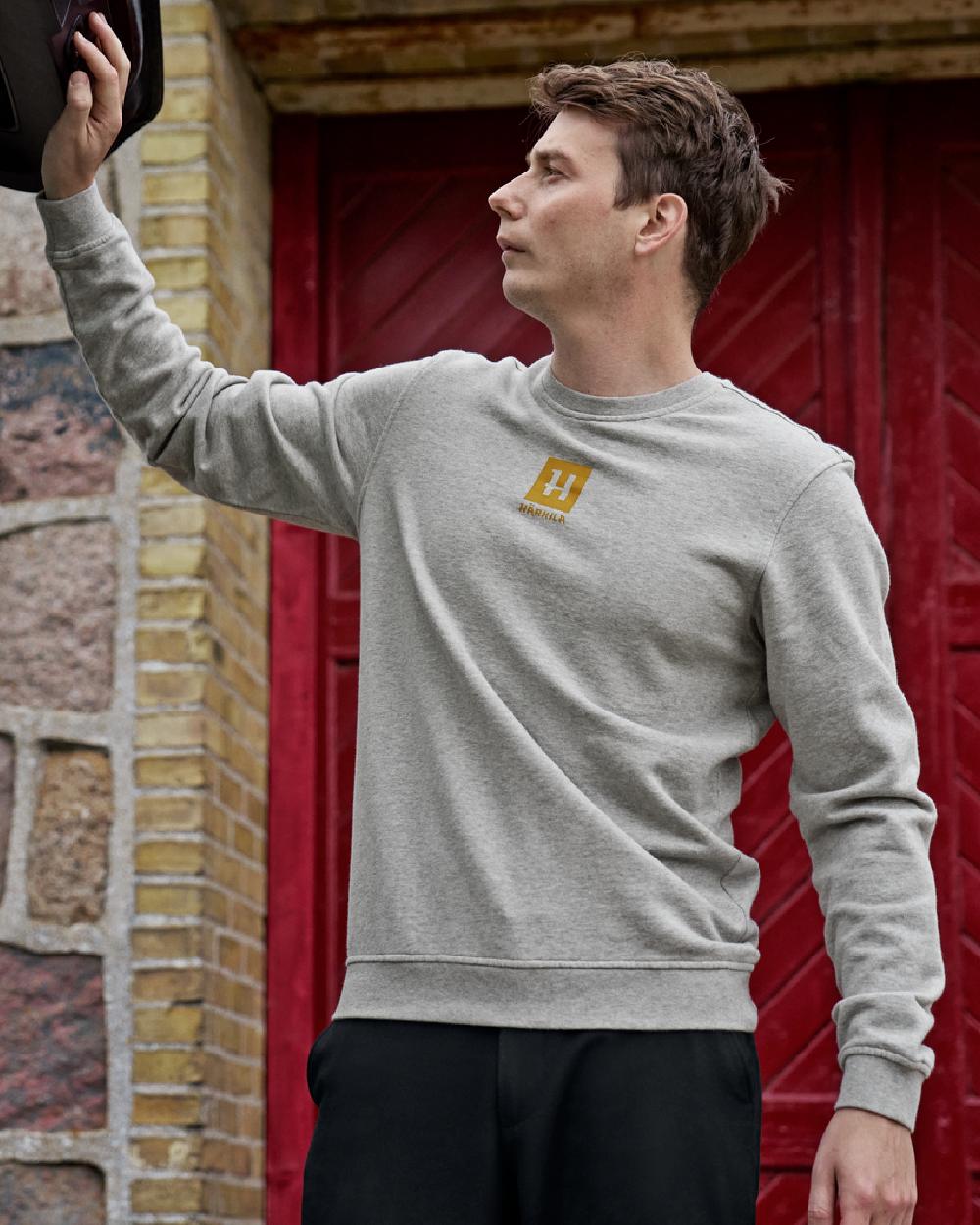 Grey Melange Coloured Harkila Mens Instinct Melange Sweatshirt on outdoor background #colour_grey-melange