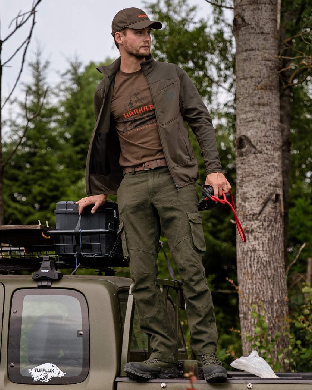 Slate Black Coloured Harkila Mens Nature Short Sleeve T-Shirt on forest background #colour_slate-black