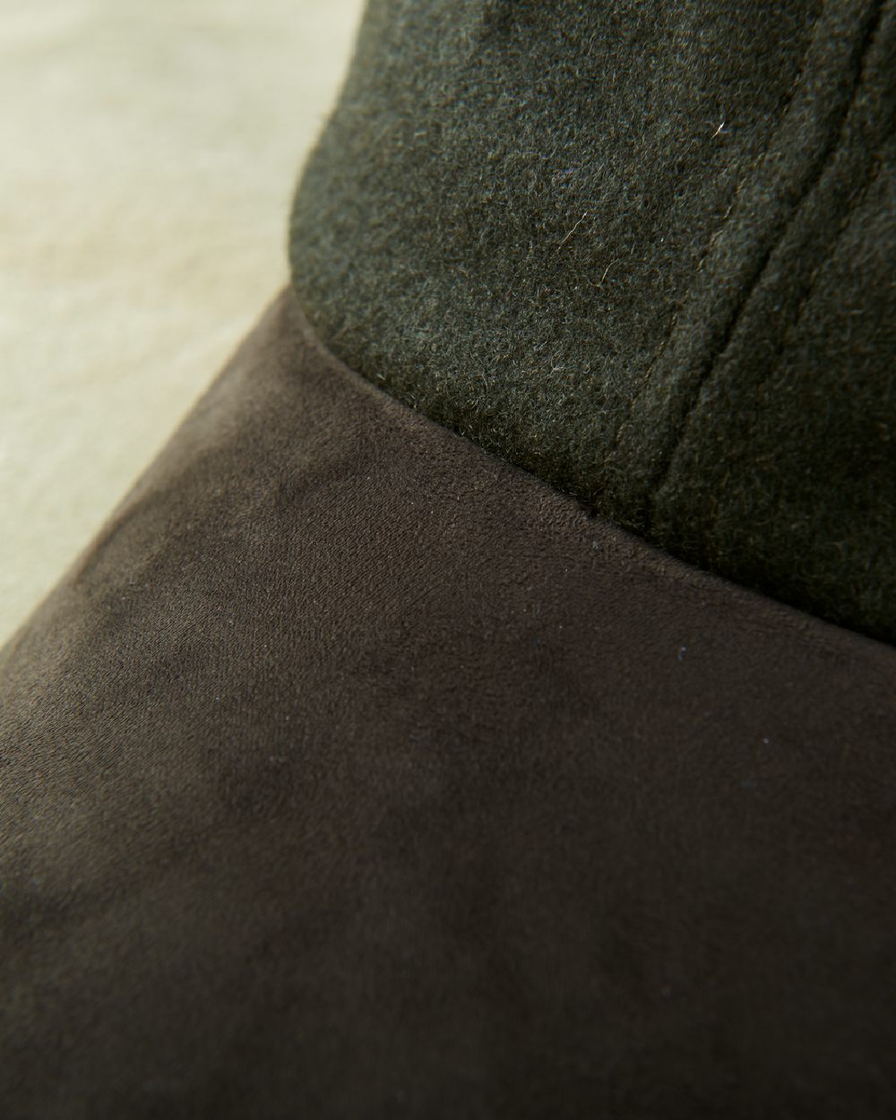 Willow Green Shadow Brown Coloured Harkila Metso Active Cap on floor background #colour_willow-green-shadow-brown