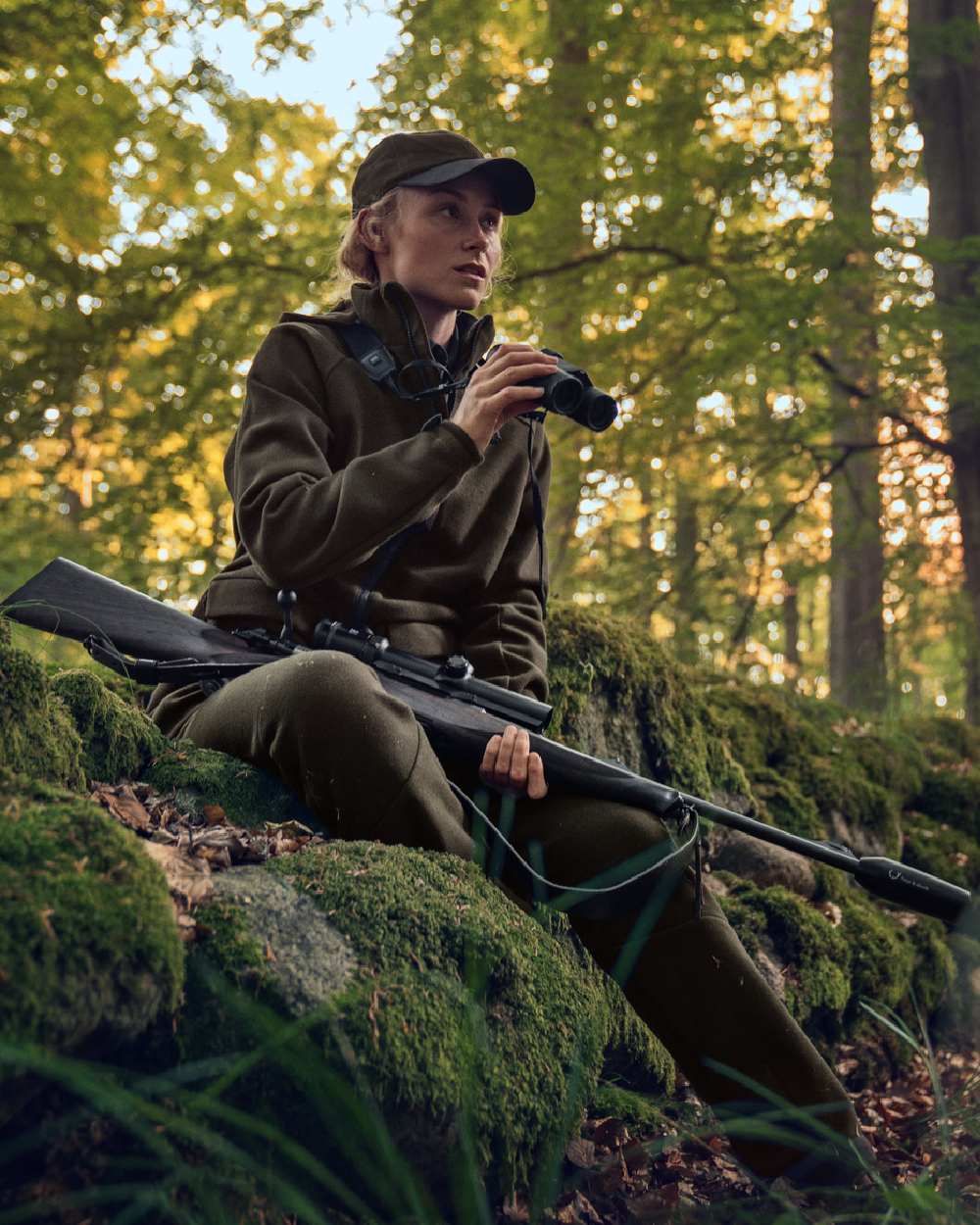 Willow Green Coloured Harkila Metso Womens Hybrid Jacket on outdoor background #colour_willow-green