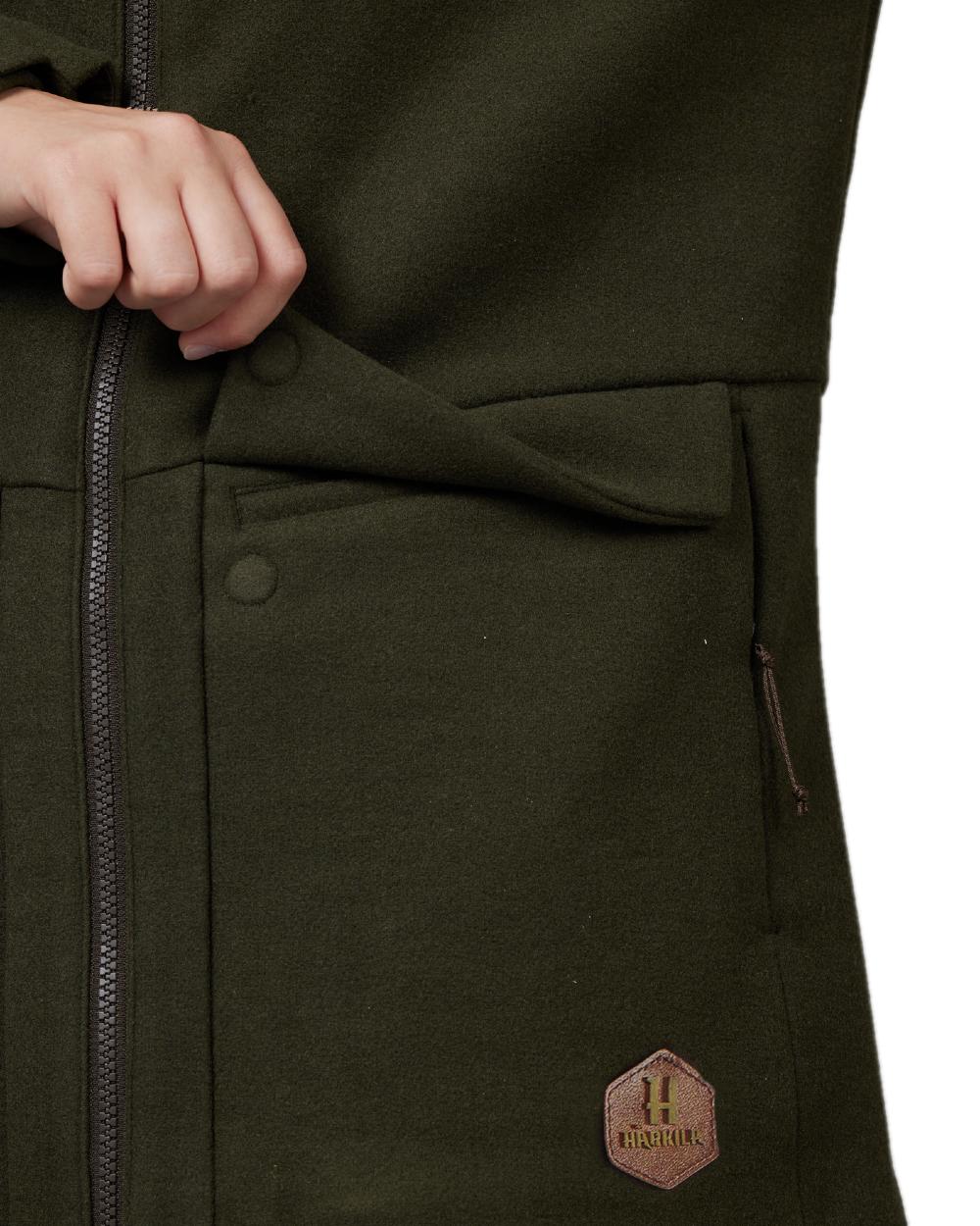 Willow Green Coloured Harkila Metso Womens Hybrid Jacket on white background #colour_willow-green