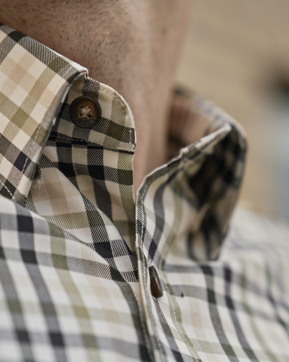 Rosin Deep Well Coloured Harkila Milford Shirt on forest background #colour_rosin-deep-well