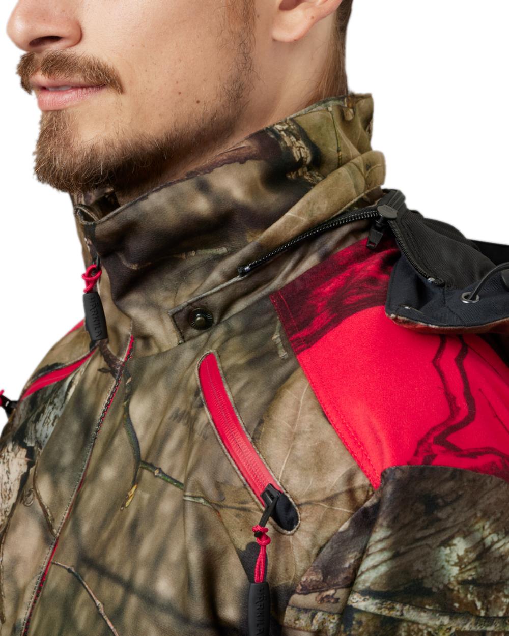 Mossy Oak Break-Up Country Mossy Oak Red Coloured Harkila Moose Hunter 2.0 GTX Jacket on white background #colour_mossy-oak-break-up-country-mossy-oak-red
