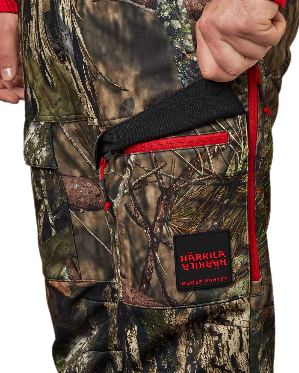 Mossy Oak Break-Up Country Red Coloured Harkila Moose Hunter 2.0 Light Trousers on white background #colour_mossy-oak-break-up-country-red