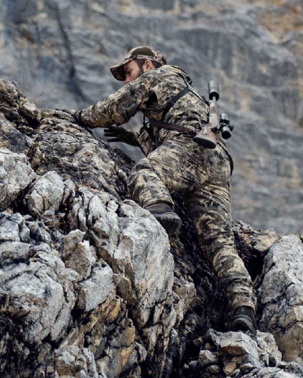 AXIS Mountain Coloured Harkila Mountain Hunter Expedition HWS Packable Jacket on outdoor background #colour_axis-mountain