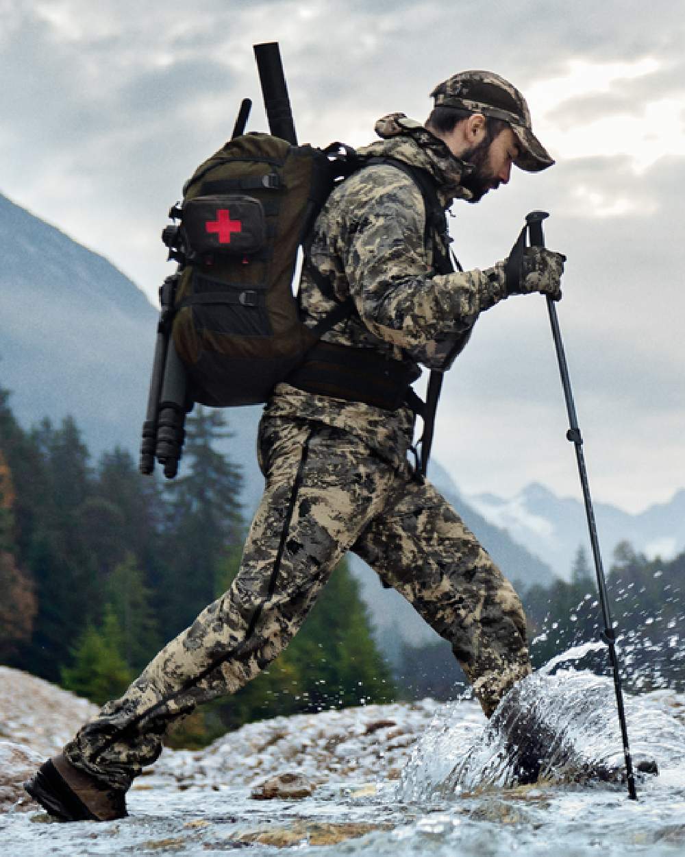 AXIS Mountain Coloured Harkila Mountain Hunter Expedition HWS Packable Jacket on outdoor background #colour_axis-mountain