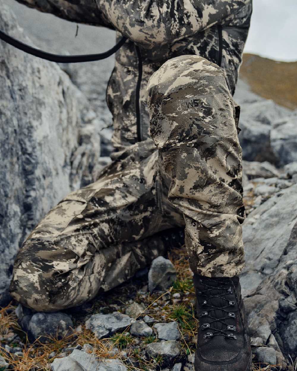 AXIS Mountain Coloured Harkila Mountain Hunter Expedition Light Trousers on outdoor background #colour_axis-mountain