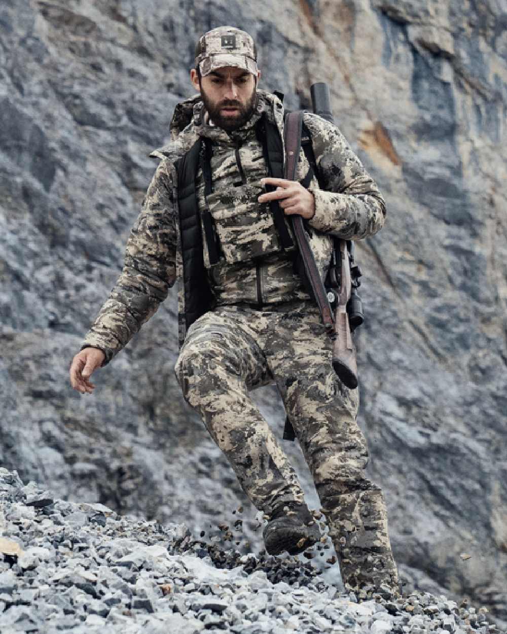 AXIS Mountain Coloured Harkila Mountain Hunter Expedition Packable Down Jacket on outdoor background #colour_axis-mountain