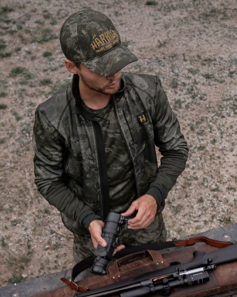 AXIS Black Black Coloured Harkila NOCTYX Camo Fleece Jacket on outdoor background #colour_axis-black-black