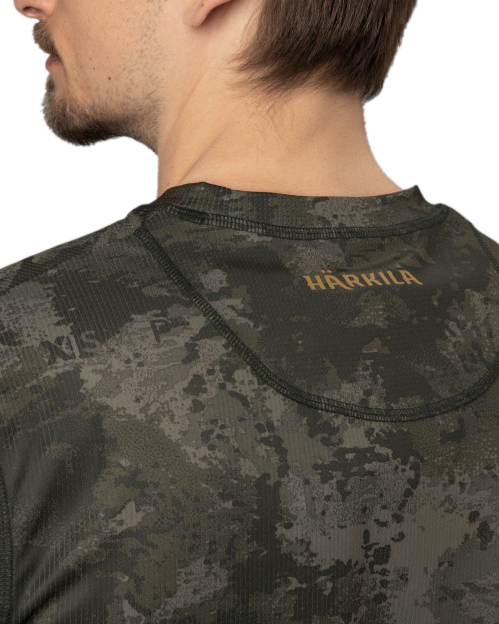 AXIS Black Coloured Harkila NOCTYX Camo Long Sleeve T-Shirt on white background #colour_axis-black