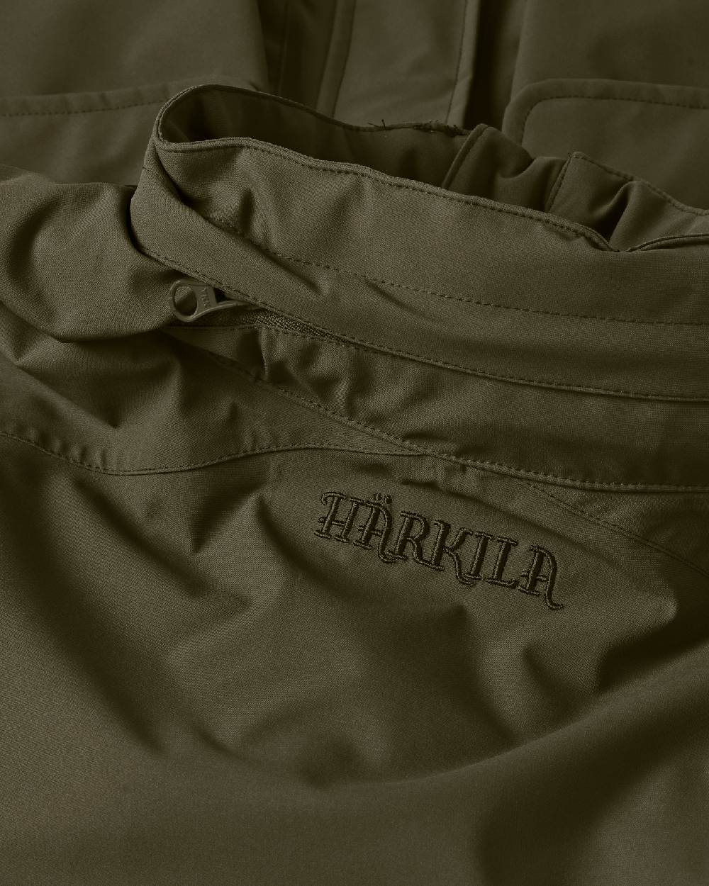 Willow Green Coloured Harkila Orton Packable Lady Jacket on white background #colour_willow-green