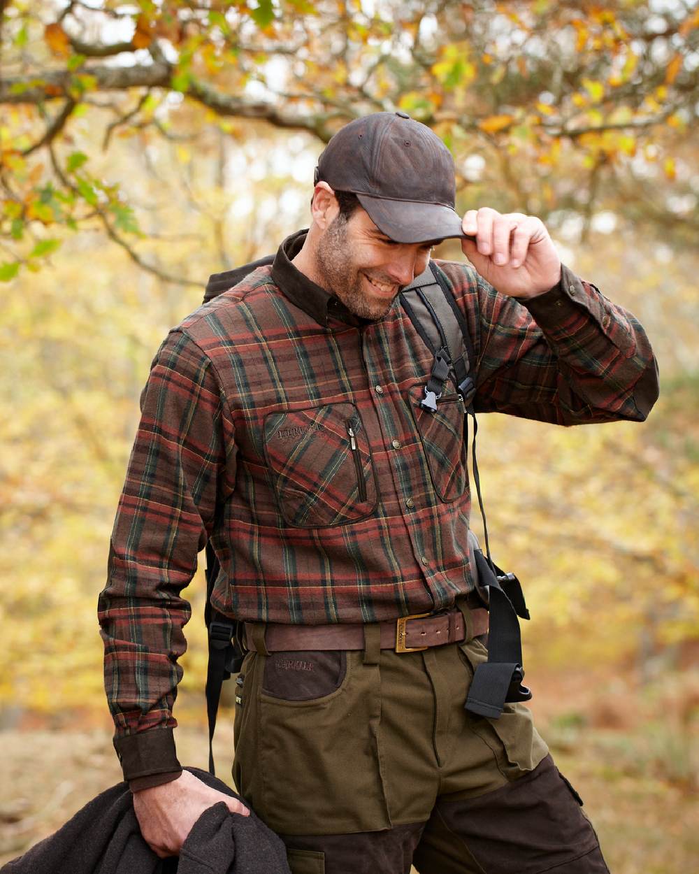 Red Check Coloured Harkila Pajala Check Shirt on outdoor background #colour_red-check