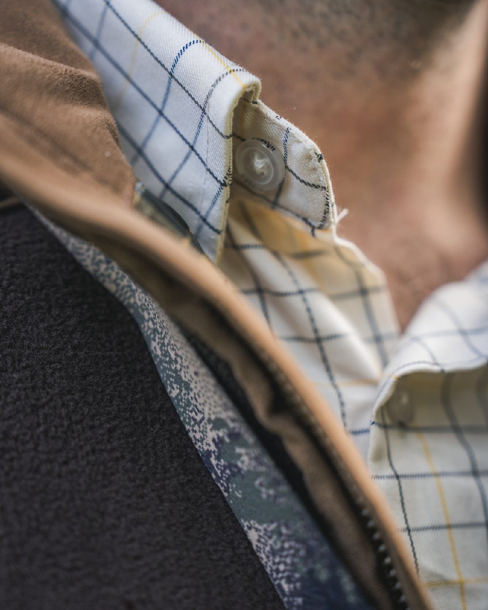 Grape Leaf Coloured Harkila Portfield Long Sleeve Shirt on blurry background #colour_grape-leaf