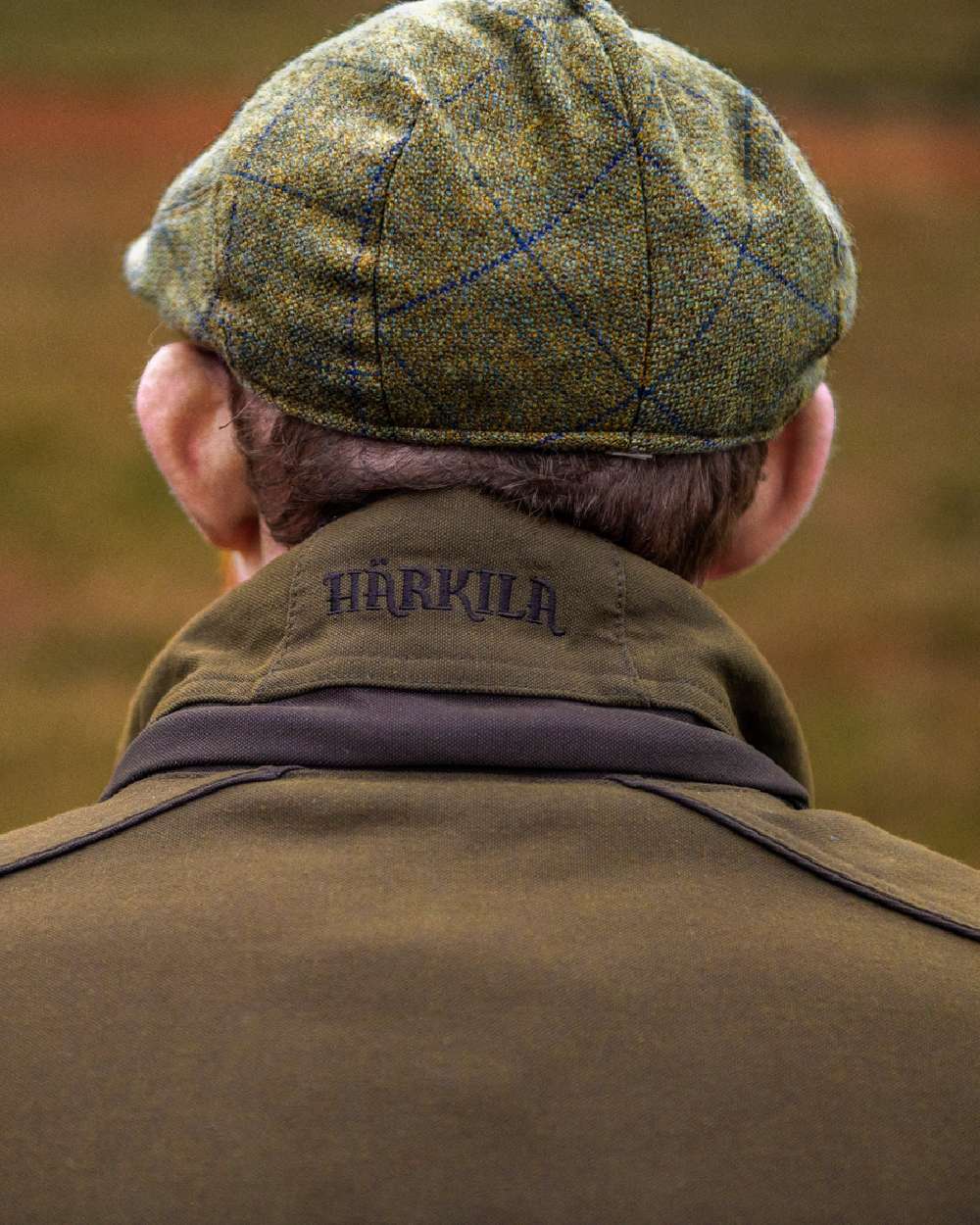 Willow Green Coloured Harkila Pro Hunter Endure Jacket on outdoor background #colour_willow-green