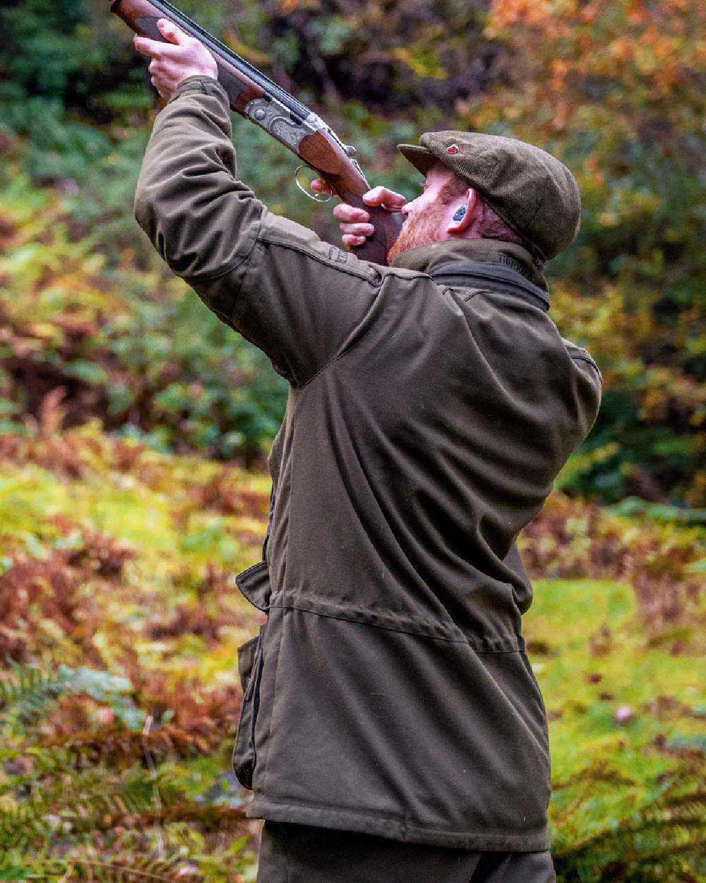 Willow Green Coloured Harkila Pro Hunter Endure Jacket on outdoor background #colour_willow-green
