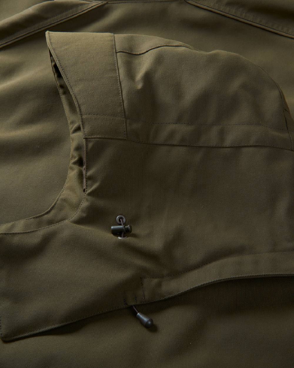 Willow Green Coloured Harkila Pro Hunter Endure Jacket on outdoor background #colour_willow-green