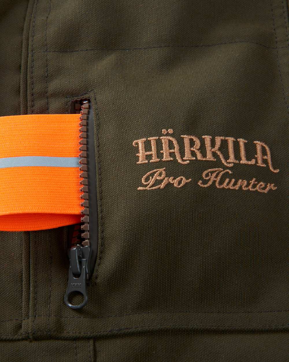 Willow Green Coloured Harkila Pro Hunter Endure Jacket on outdoor background #colour_willow-green