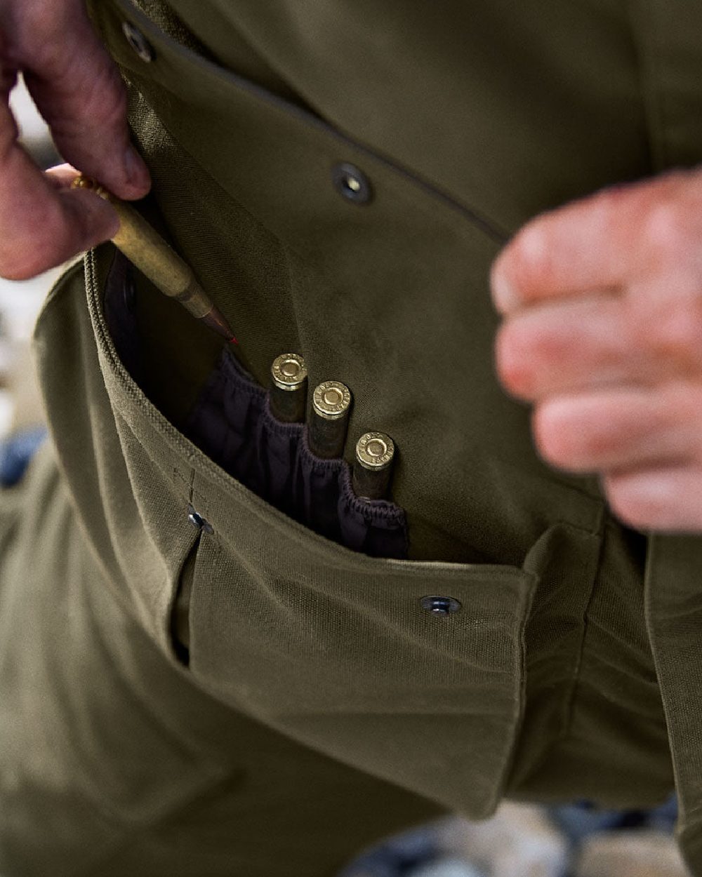 Willow Green Coloured Harkila Pro Hunter Endure Jacket on outdoor background #colour_willow-green