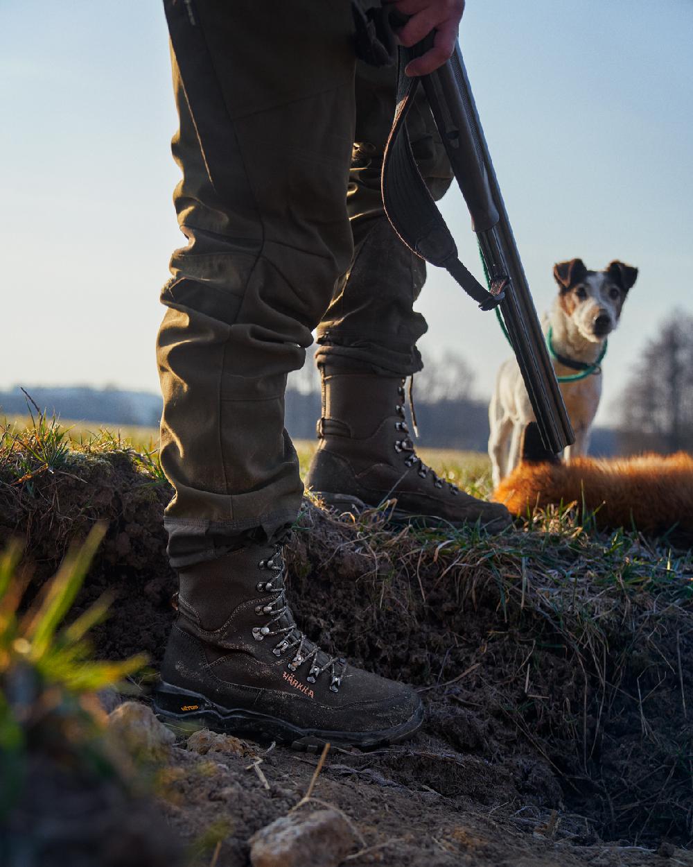 Shadow Brown Coloured Harkila Pro Hunter Light Hi GTX Boots on outdoor background #colour_shadow-brown