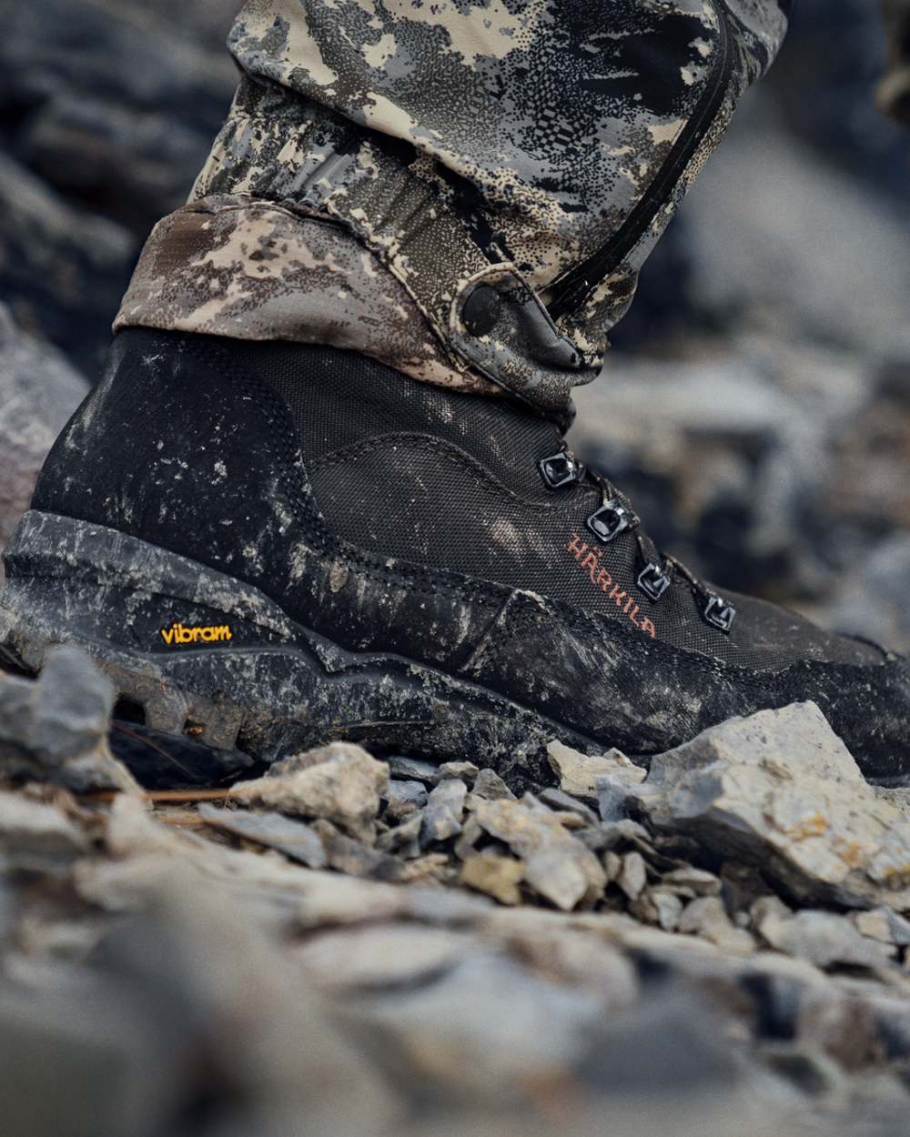Shadow Brown Coloured Harkila Pro Hunter Light Mid GTX Boots on outdoor background #colour_shadow-brown