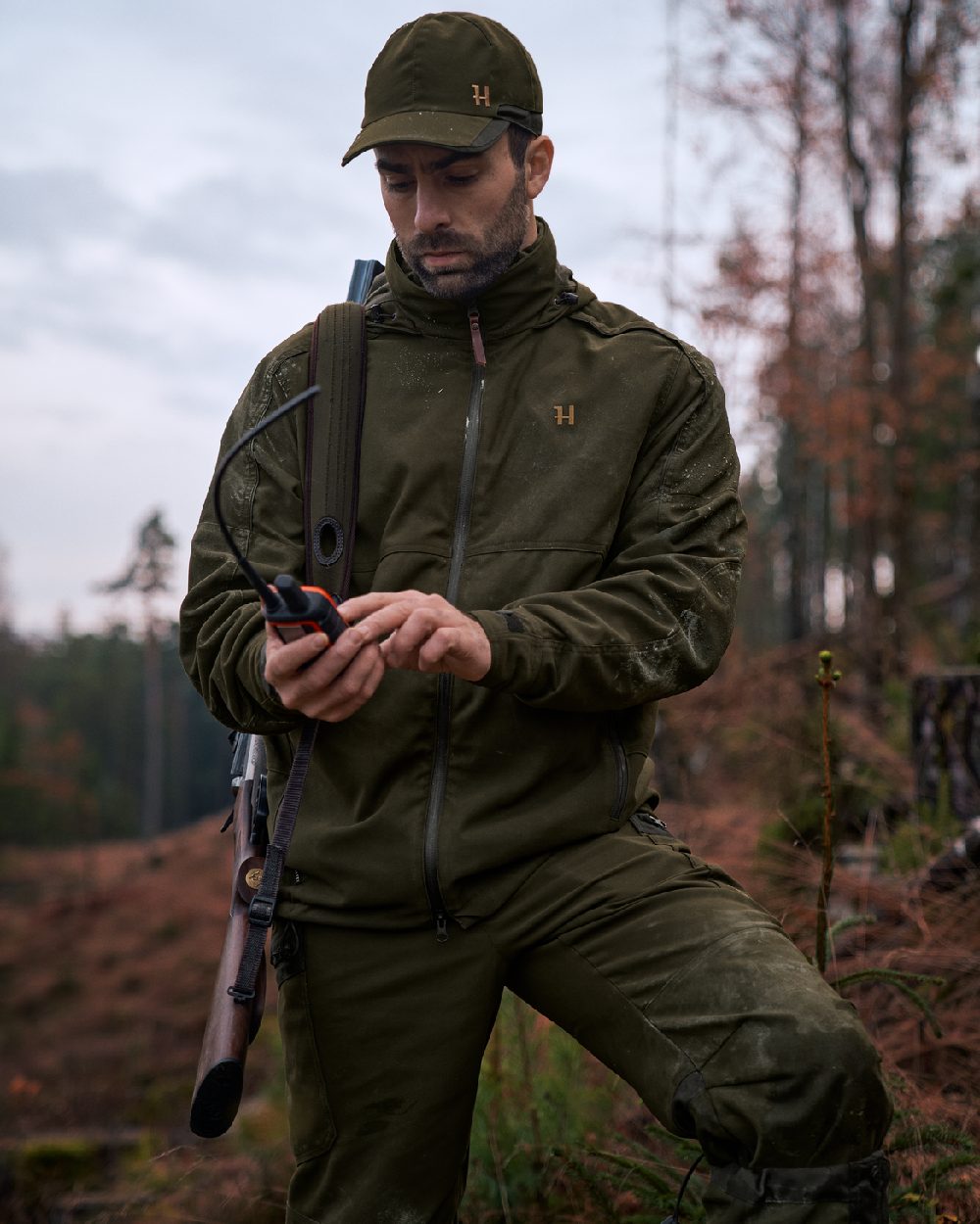 Willow Green Coloured Harkila Pro Hunter Move 2.0 GTX Jacket on outdoor background #colour_willow-green