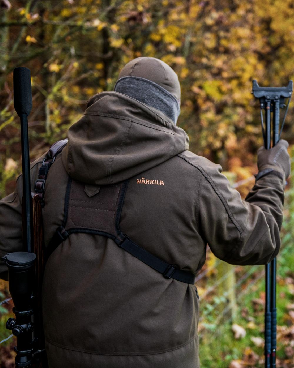 Willow Green Coloured Harkila Pro Hunter Move 2.0 GTX Jacket on outdoor background #colour_willow-green