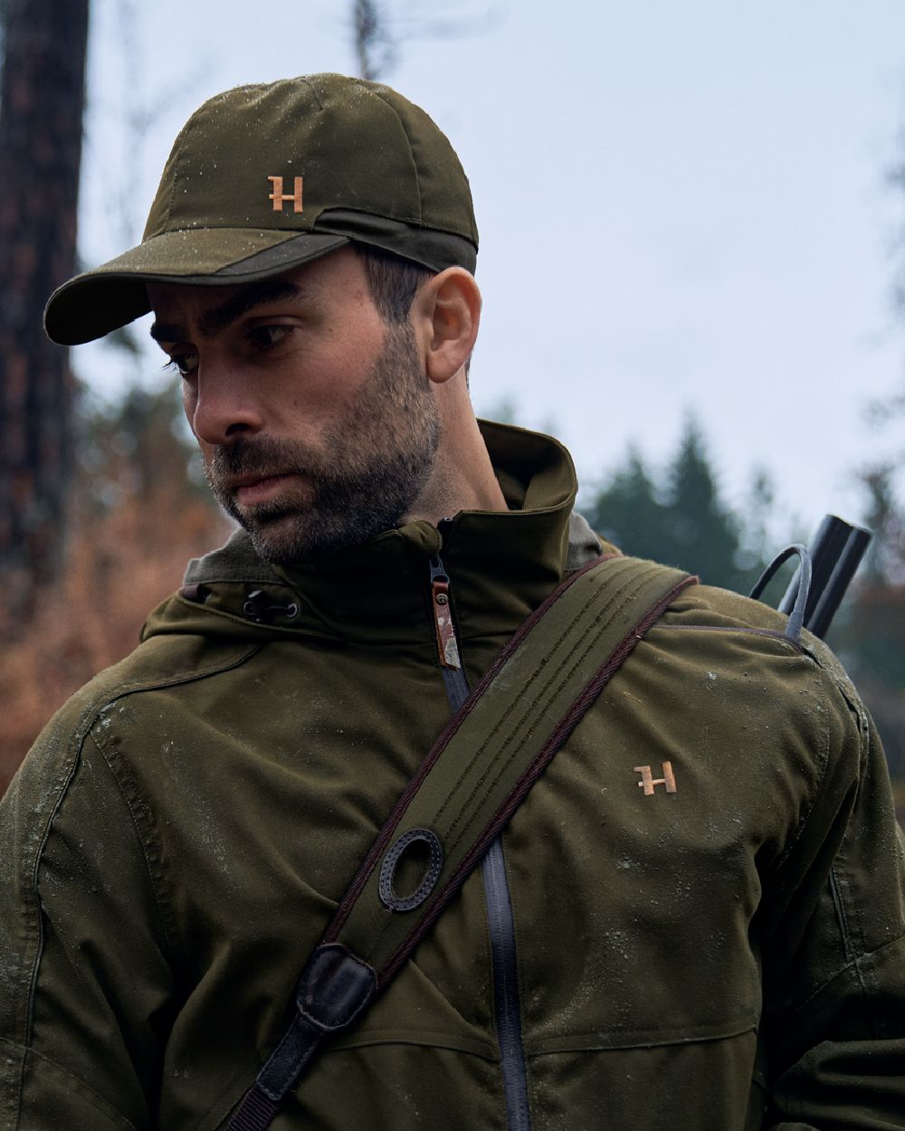 Willow Green Coloured Harkila Pro Hunter Move 2.0 GTX Jacket on outdoor background #colour_willow-green