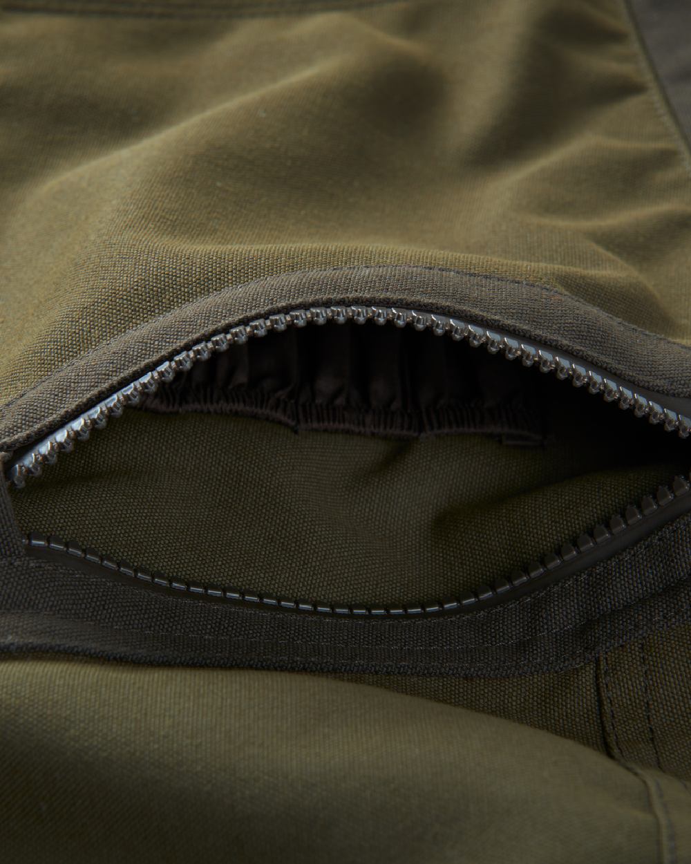 Willow Green Coloured Harkila Pro Hunter Move Trousers on white background #colour_willow-green
