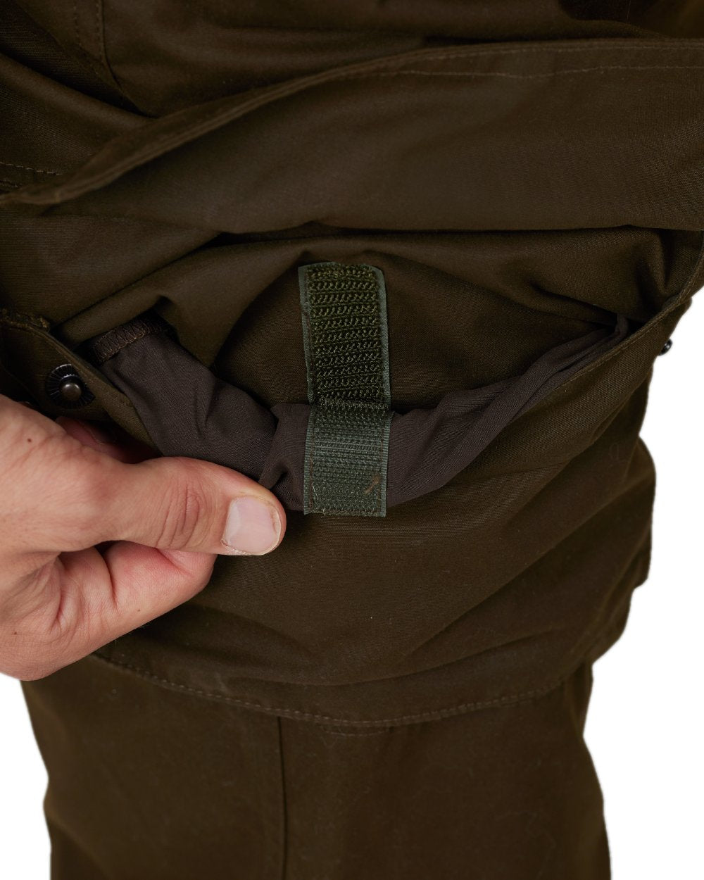 Dark Warm Olive Coloured Harkila Retrieve Light Trousers on white background #colour_dark-warm-olive