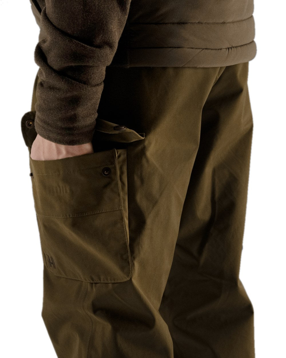 Warm Olive Coloured Harkila Retrieve Trousers on white background #colour_warm-olive