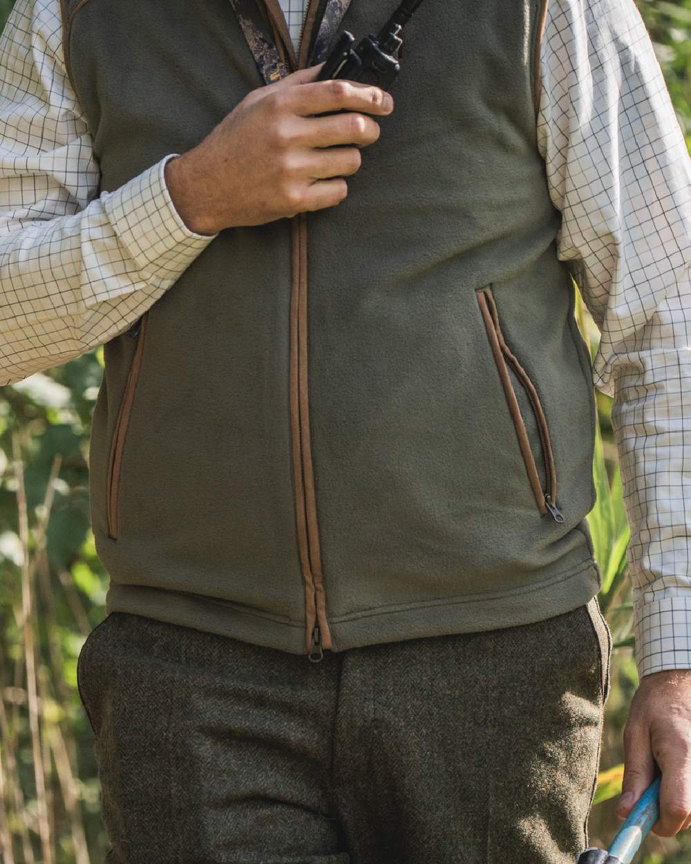 Grape Leaf Coloured Harkila Sandhem 200 Fleece Waistcoat on outdoor background #colour_grape-leaf