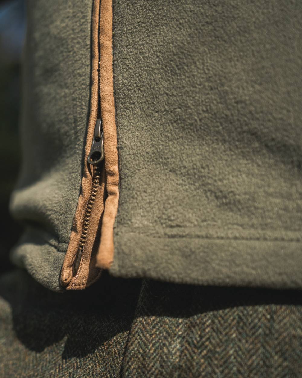 Grape Leaf Coloured Harkila Sandhem 200 Fleece Waistcoat on outdoor background #colour_grape-leaf