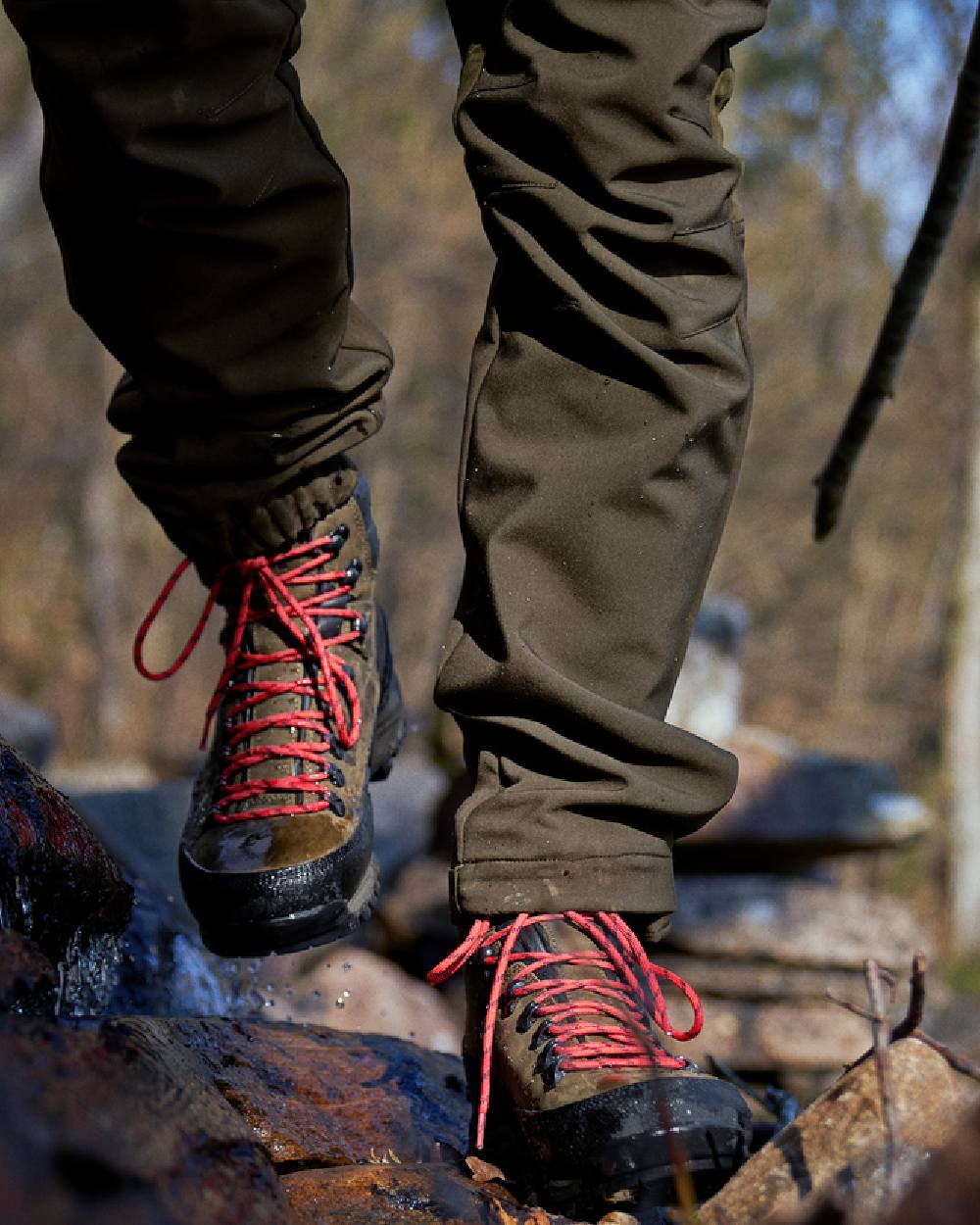 Willow Green Coloured Harkila Saxnas GTX Boots on blurry background #colour_willow-green