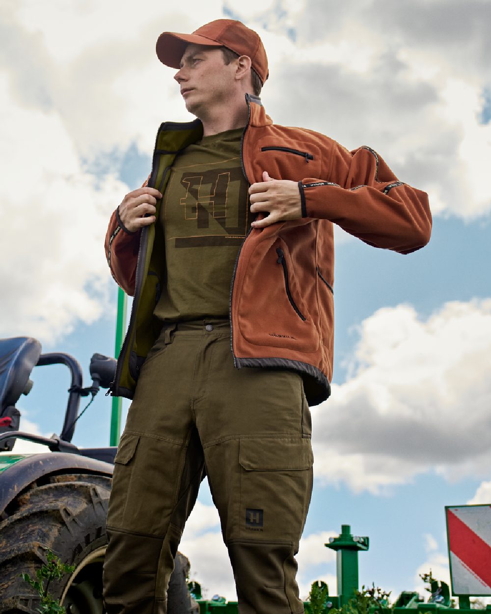Dark Olive Willow Green Coloured Harkila Scandinavian Trousers on outdoor background #colour_dark-olive-willow-green