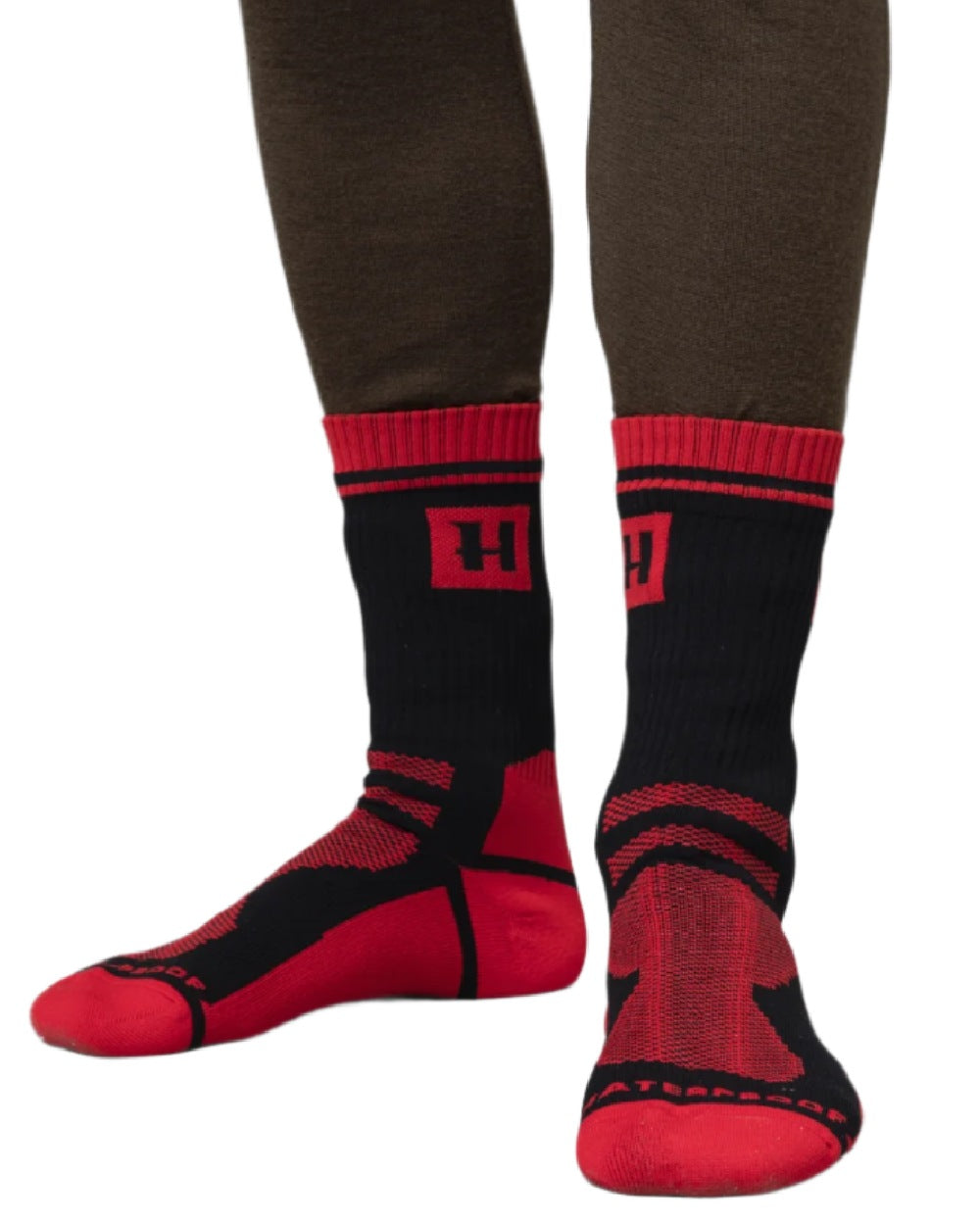 Red Black Coloured Harkila Waterproof Socks on white background #colour_red-black