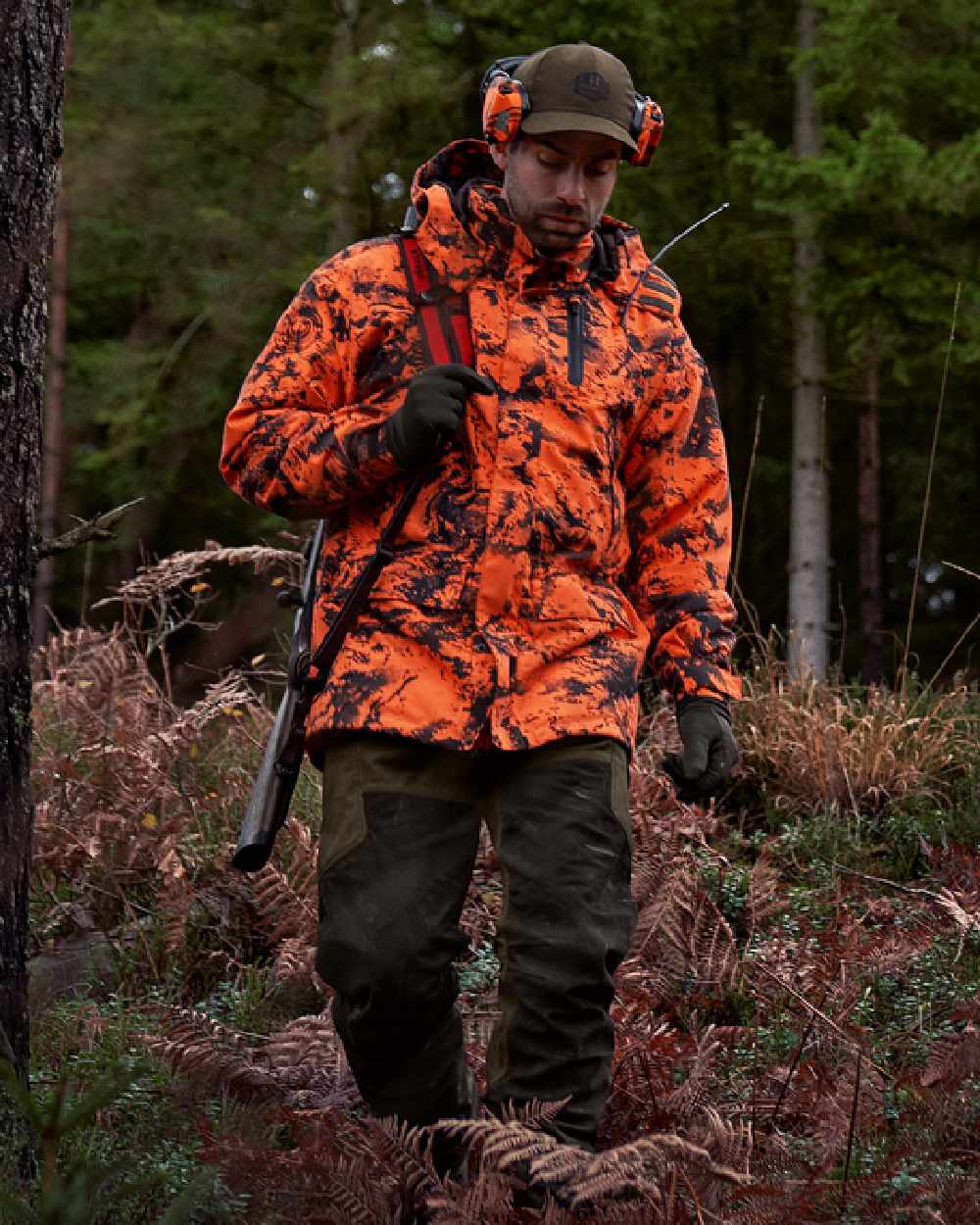 AXIS Orange Blaze Coloured Harkila Wildboar Pro HWS Insulated Jacket on outdoor background #colour_axis-orange-blaze