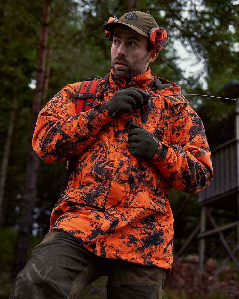 AXIS Orange Blaze Coloured Harkila Wildboar Pro HWS Insulated Jacket on outdoor background #colour_axis-orange-blaze