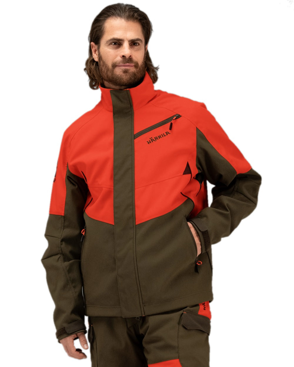 Wildboar Orange Willow Green Coloured Harkila Wildboar Pro Jacket on white background #colour_wildboar-orange-willow-green