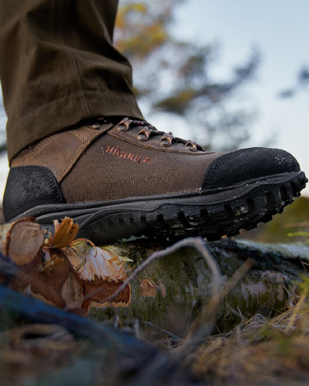 Mid Brown Coloured Harkila Wildwood 2.0 GTX Womens Waterproof Boots on outdoor background #colour_mid-brown