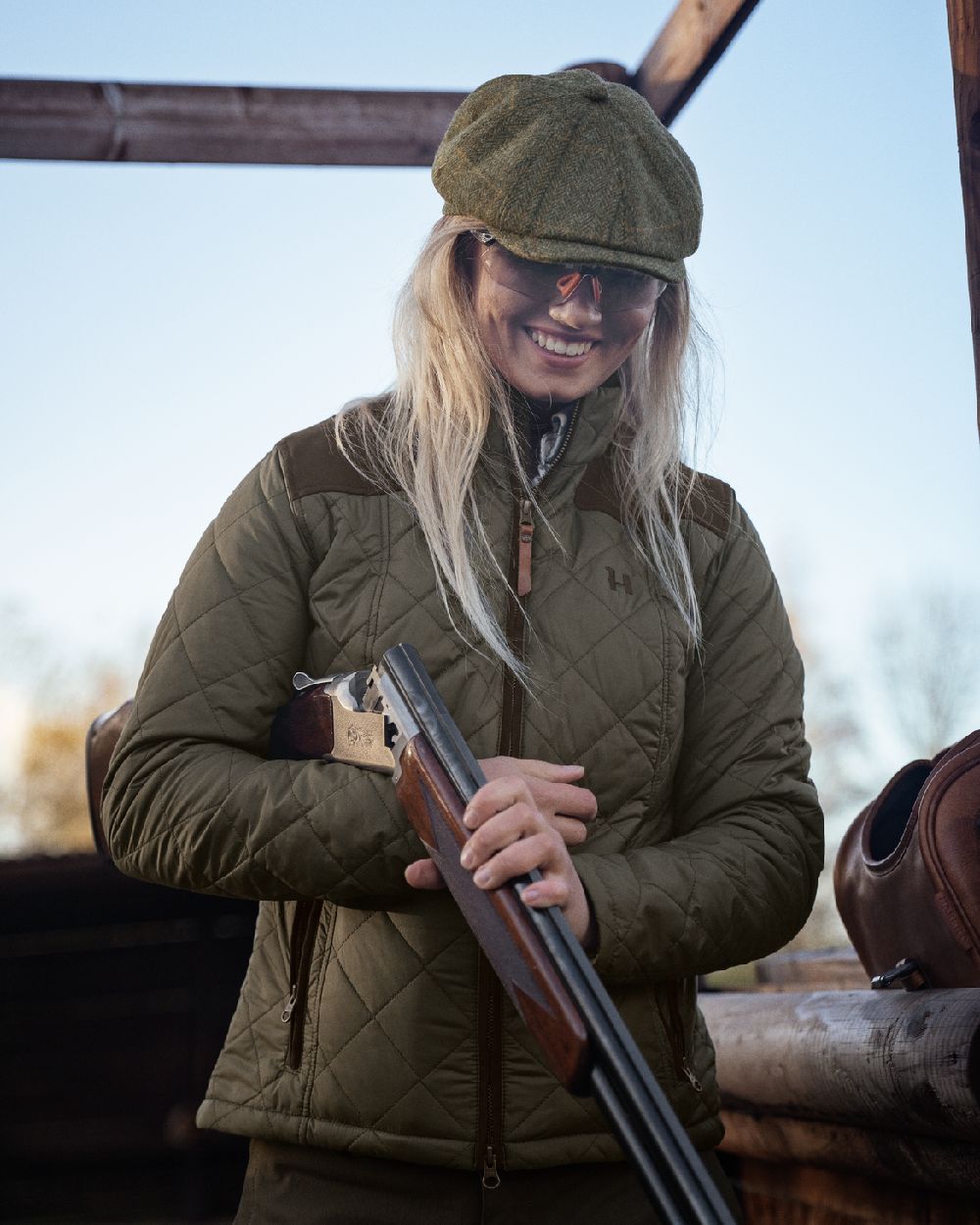 Willow Green Coloured Harkila Womens Ailsa Quilted Jacket on outdoor background #colour_willow-green