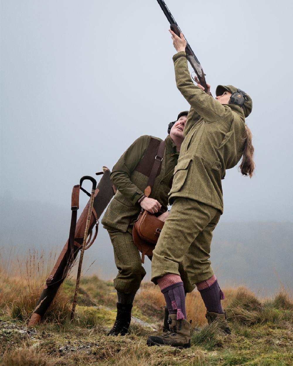 Olive Coloured Harkila Womens Jura GTX Jacket on forest background #colour_olive